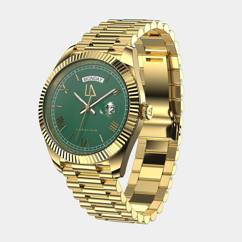 Gouden horloge met groene accenten